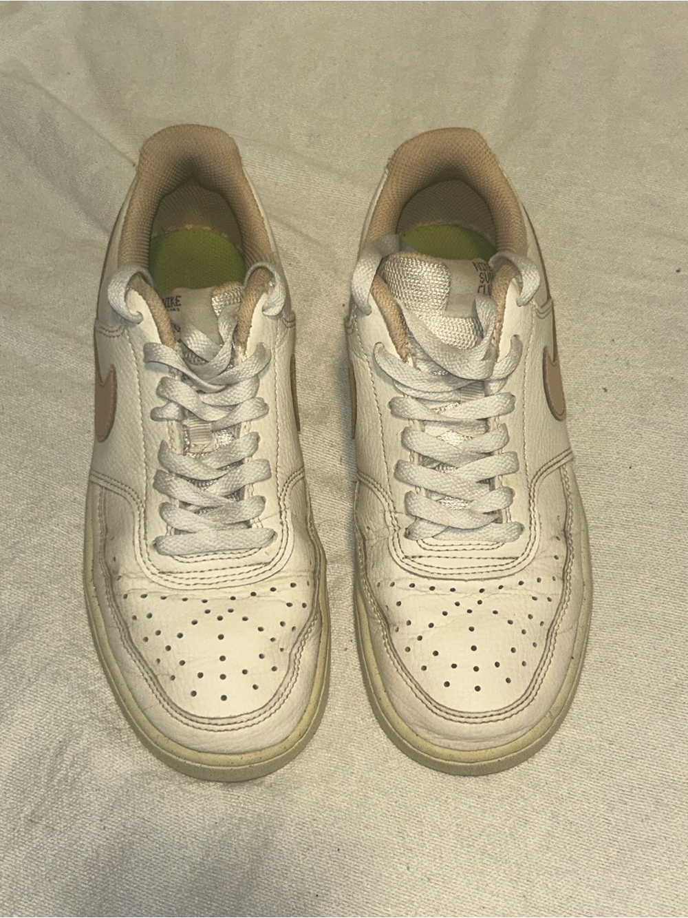 Nike Women’s Low-Top Sneakers in White with Tan Swoosh